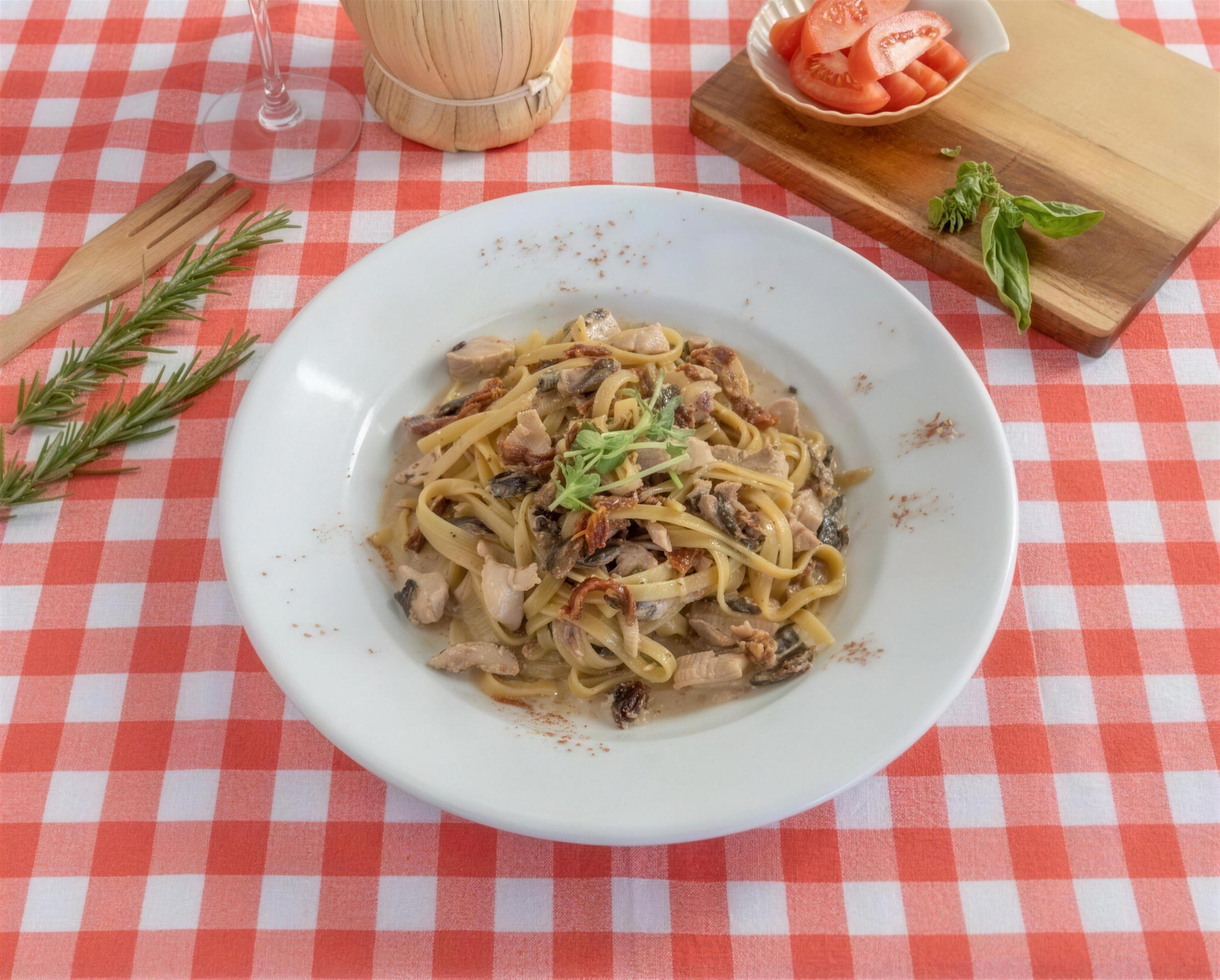 Fettuccine Alle Noci with chicken, mushroom and sundried tomato in a creamy sauce